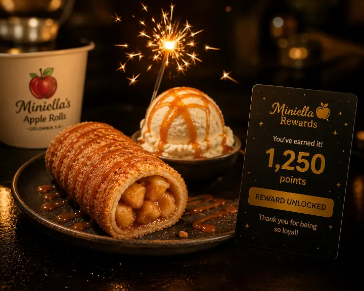 Miniella Apple Roll combo with ice cream and caramel sauce, sparkler, rewards card says '1,250 points – REWARD UNLOCKED', cinematic lighting.